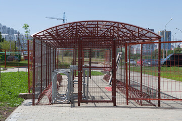 The place is a premise, a shed for storing bicycles for residents of multi-storey buildings.