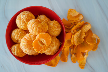 Peeled Fresh Organic Tangerines in a bowl