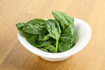 Fresh green spinach leaves in the bowl