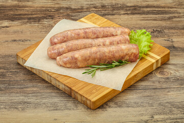 Raw pork meat sausages for grill