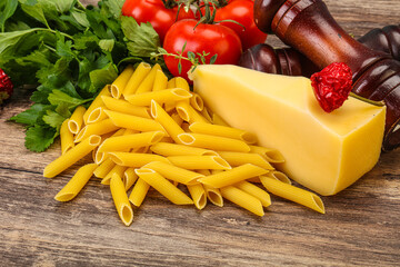 Raw penne rigate for cooking