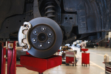 disc brake of the vehicle for repair. car repairing in garage