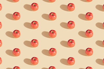 Pattern fresh organic apple with pastel beige background.Minimal sunlight flat  layout