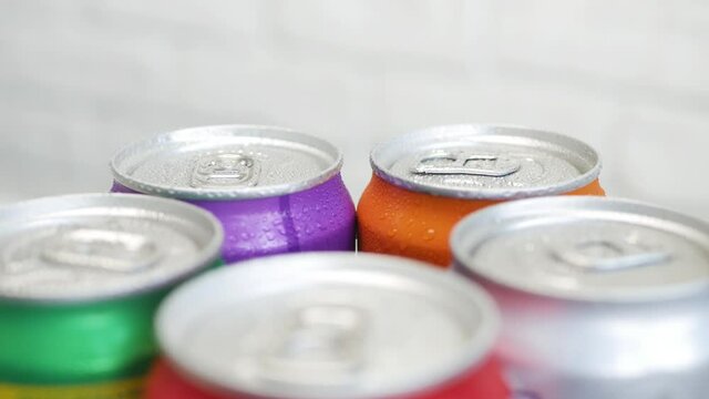 Shooting with Refreshing Pop Can Drinks. Various Cold, Sweet, and Carbonated Refreshing Drinks. 
