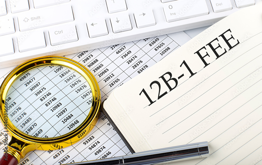 Poster 12b -1 fee text on the notebook with chart, magnifier,keyboard and pen