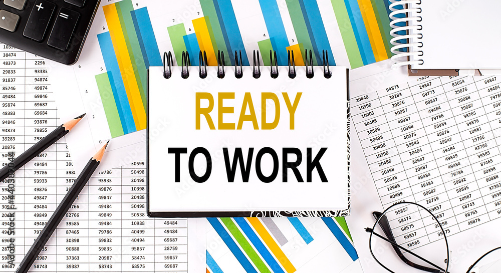 Poster closeup a notebook with text ready to work , business concept image on chart background