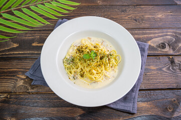 Italian Carbonara Spaghetti on a white plate