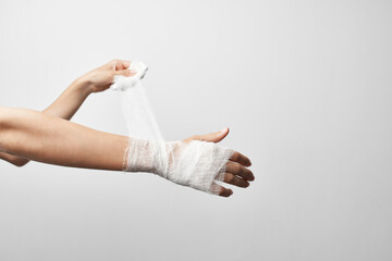 bandaged arm grass pain treatment hospitalization