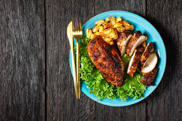 Jerk chicken breasts with grilled ananas cubes