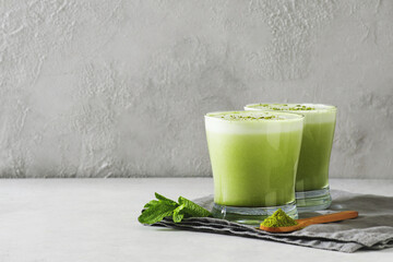 Green smoothie mint or matcha latte in glass