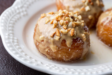 Traditional delicious Turkish dessert; Tahini and hazelnuts on Kemalpasa dessert