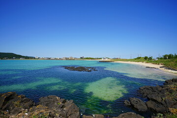 a beautiful seaside landscape with crystal clear water, scenery around sinyang beach