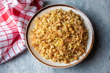 Traditional delicious Turkish food; bulgur pilaf with chickpea (Turkish name; nohutlu bulgur pilavi)