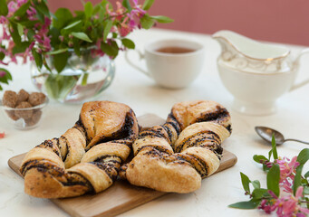 Sweet fragrant braided bun, sweet pastries for tea
