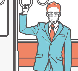 つり革につかまるマスクの男性　電車内