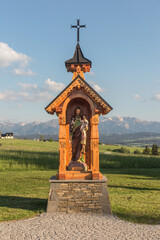 Prydrożna chapel of St. Joseph with Jesus near the church in Bachledowce near the Tatra Mountains, in the place of repeated prayer and rest stays of Stefan, Cardinal Wyszyński,
