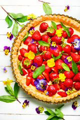 Open summer pie with strawberry