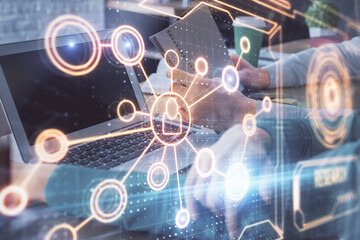 Double exposure of man and woman working together and social network theme hologram drawing. People connection concept. Computer background.