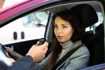 Policeman Doing Driver Alcohol Test