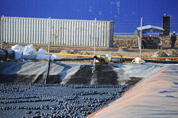 East Kazakhstan region, Kazakhstan - 12.02.2015 : The chemical tank is covered with plastic balls...