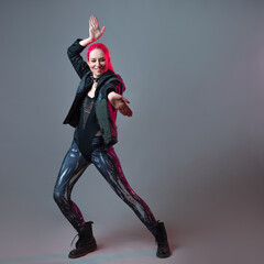Futuristic fashion, a young bright and attractive woman with pink hair,
