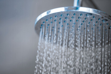 Close up to Outdoor shower head for the bath and showering cold water to body before jumping in the...