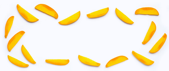 Tropical fruit, Frame made of mango  slices on white background.