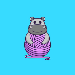 Cute hippopotamus playing with wool yarn. Animal cartoon concept isolated. Can used for t-shirt, greeting card, invitation card or mascot. Flat Cartoon Style