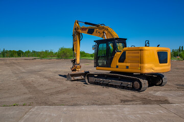 yellow excavator. Also called diggers, JCB, mechanical shovels, or 360-degree excavators