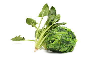 Boiled spinach on the white background