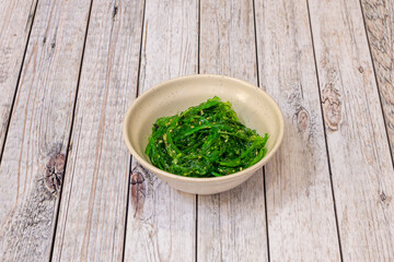 Small wakame seaweed salad with sesame seeds