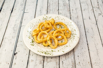Squid rings battered with flour and egg for an Andalusian squid