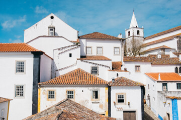 A picturesque view of the medieval town of Óbidos in Portugal