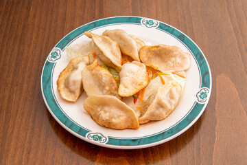 Grilled fried dim sum Chinese dumplings stuffed with vegetables