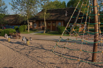 Fototapeta na wymiar Bungalows in Safari Park in Dvůr Králové nad Labem, Eastern Bohemia, Czech Republic, Europe 