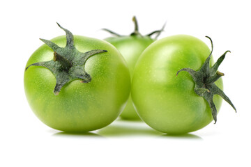 Green tomatoes on white background