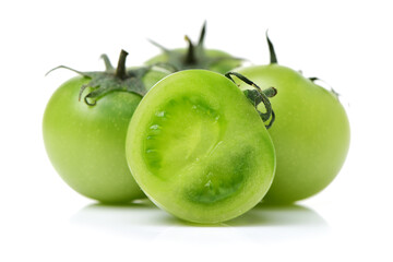 Green tomatoes on white background