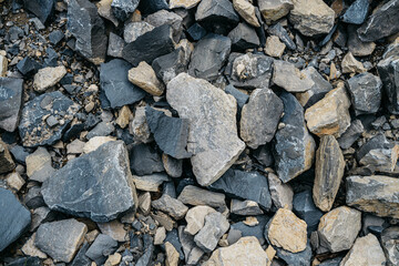 Rough grey rocks pictured from above