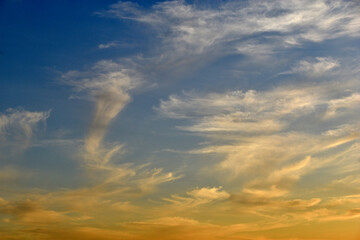 Sunset sky with clouds in the evening in summer