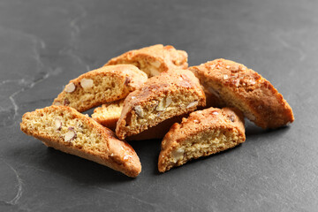 Traditional Italian almond biscuits (Cantucci) on grey table