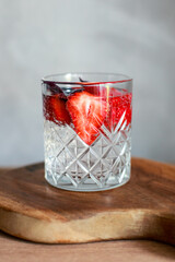 Non-alcoholic cocktail with soda, strawberries and basil