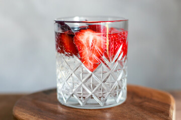 Non-alcoholic cocktail with soda, strawberries and basil