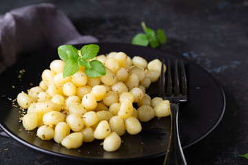 Gnocchi with olive oil, garlic and basil