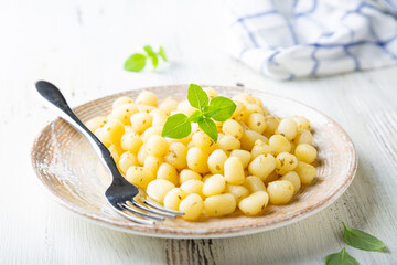 Gnocchi with olive oil, garlic and basil