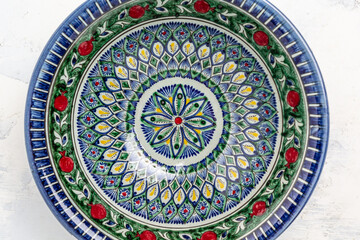 Ethnic Uzbek ceramics with traditional uzbekistan ornament. traditional Uzbek utensil
