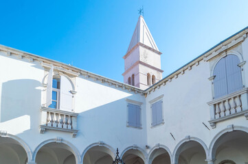 Lovely cloister of The Minorite Monastery and the attached Church of St Francis Assisi in the town's historic district. Old town Piran, Slovenia.