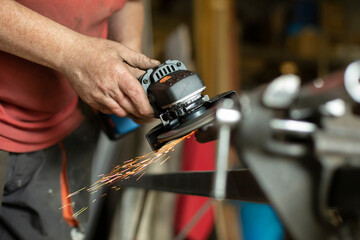 A man works in a garage.