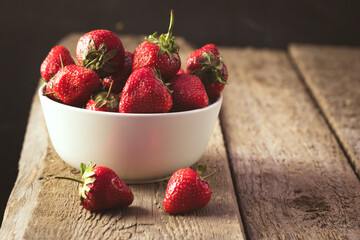 Tasty Strawberries in a Bowl Old Wooden Background Horizontal Copy Space