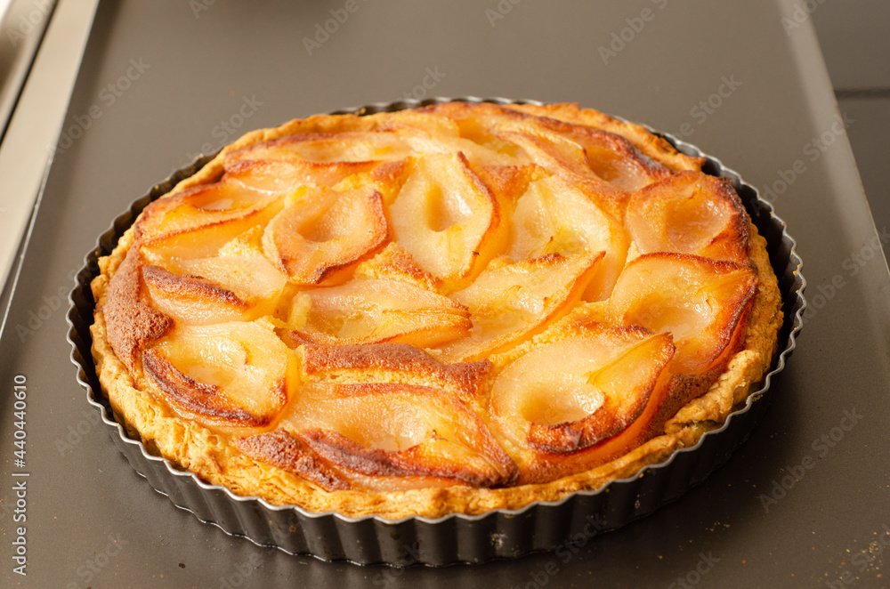 Sticker closeup shot of french pear tart on a pan