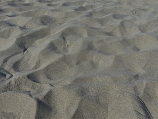 Muster im Sand am Strand